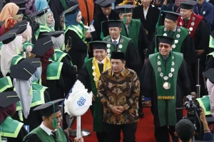 Kadis Perindag Jambi Nella Ervina Resmi Dikenakan Gelar Doktor, Menandai Pencapaian Akademik Tinggi