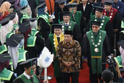 Kadis Perindag Jambi Nella Ervina Resmi Dikenakan Gelar Doktor, Menandai Pencapaian Akademik Tinggi