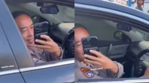 Viral Perwira Merokok Saat Nyetir, Polda Kalsel Minta Maaf