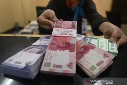 BI Naikkan Suku Bunga, Rupiah Menguat 129 Poin
