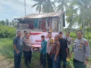 Polres Inhil Sambut Hari Bhayangkara ke-80 dengan Sembako kepada Warga